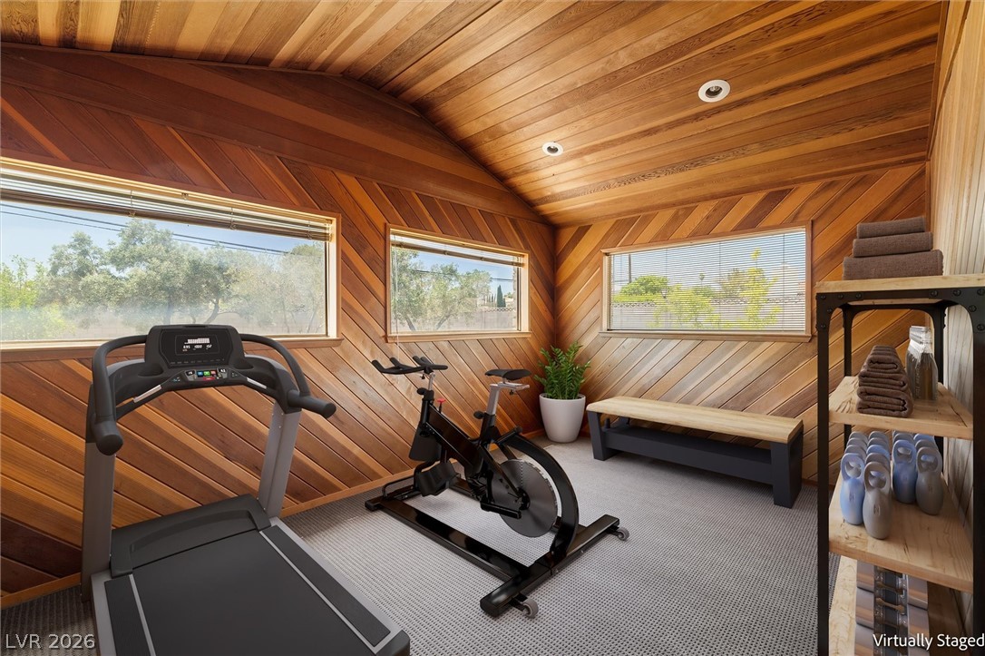 3090 Westwind Road Las Vegas, NV 89146 - Photo 25 of 49 Workout room with wooden walls, carpet flooring, recessed lighting, and a vaulted wood ceiling