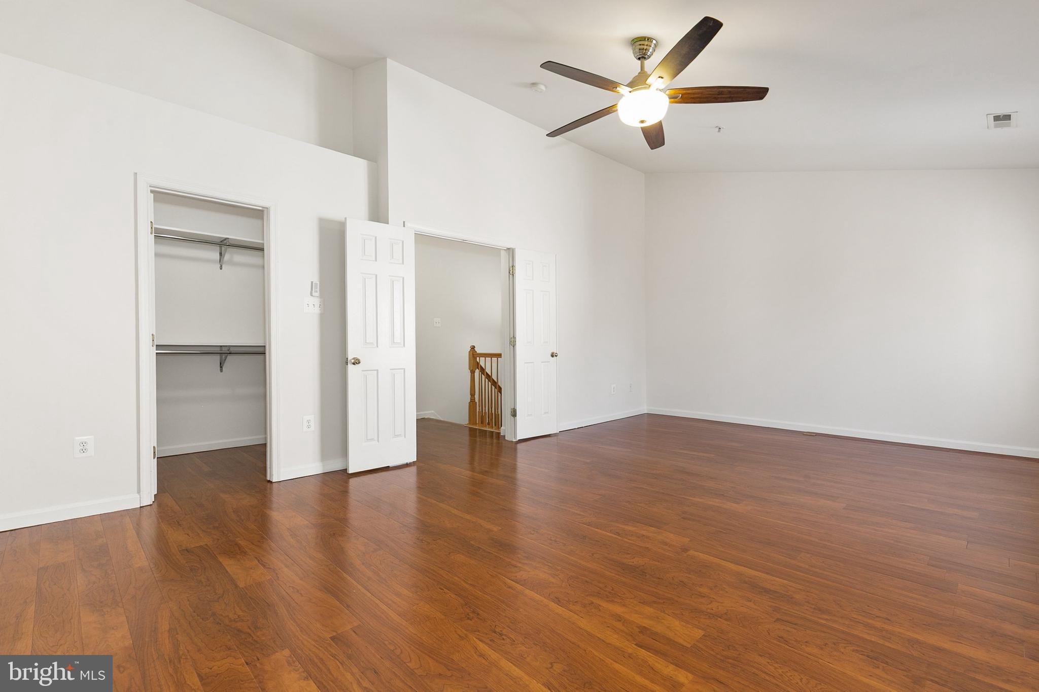 9956 Fragrant Lilies Way Laurel, MD 20723 - Photo 32 of 60 a view of an empty room and wooden floor