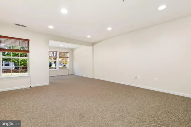 a view of a tree front of a house
