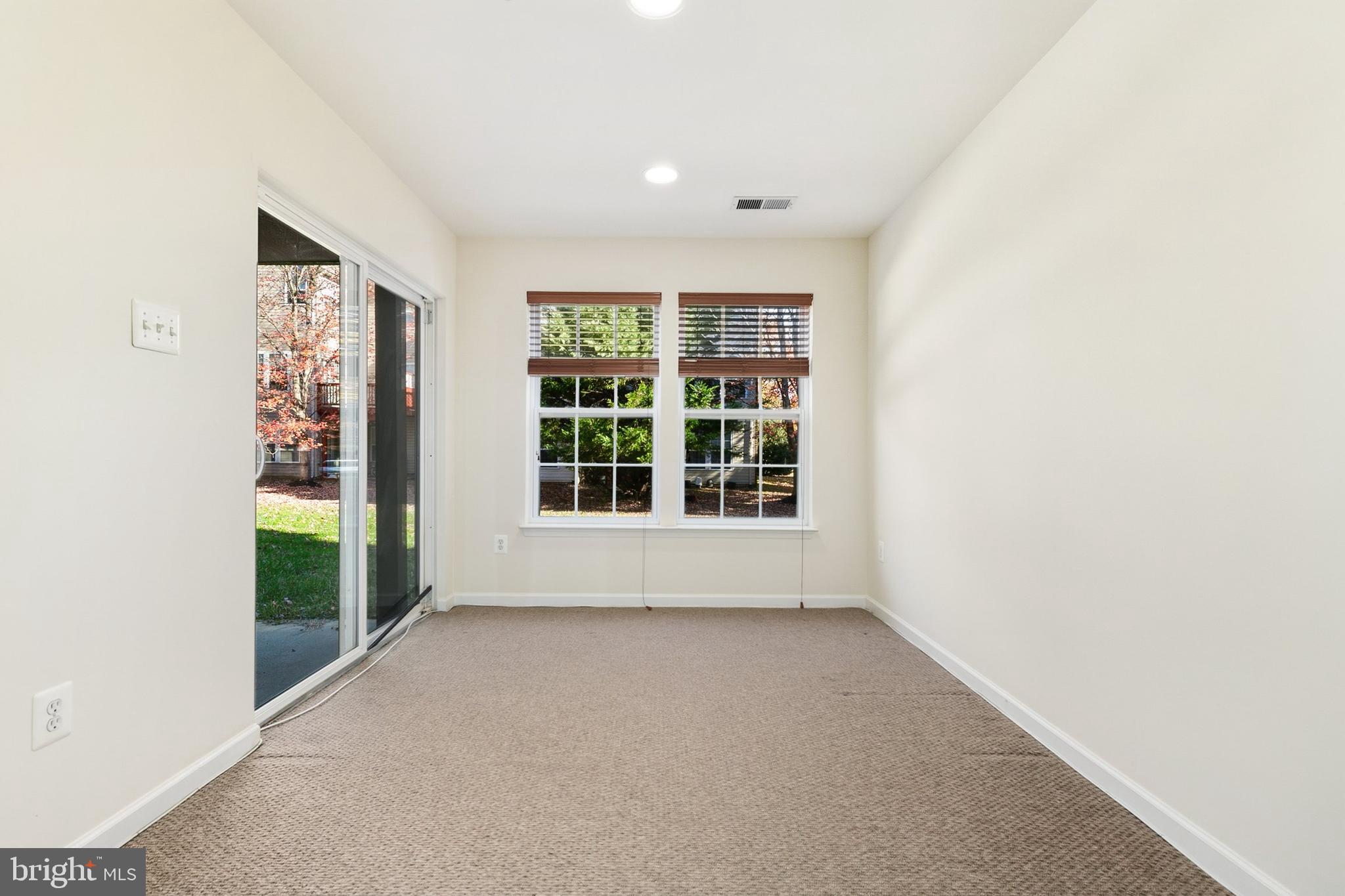 9956 Fragrant Lilies Way Laurel, MD 20723 - Photo 46 of 60 an empty room with windows