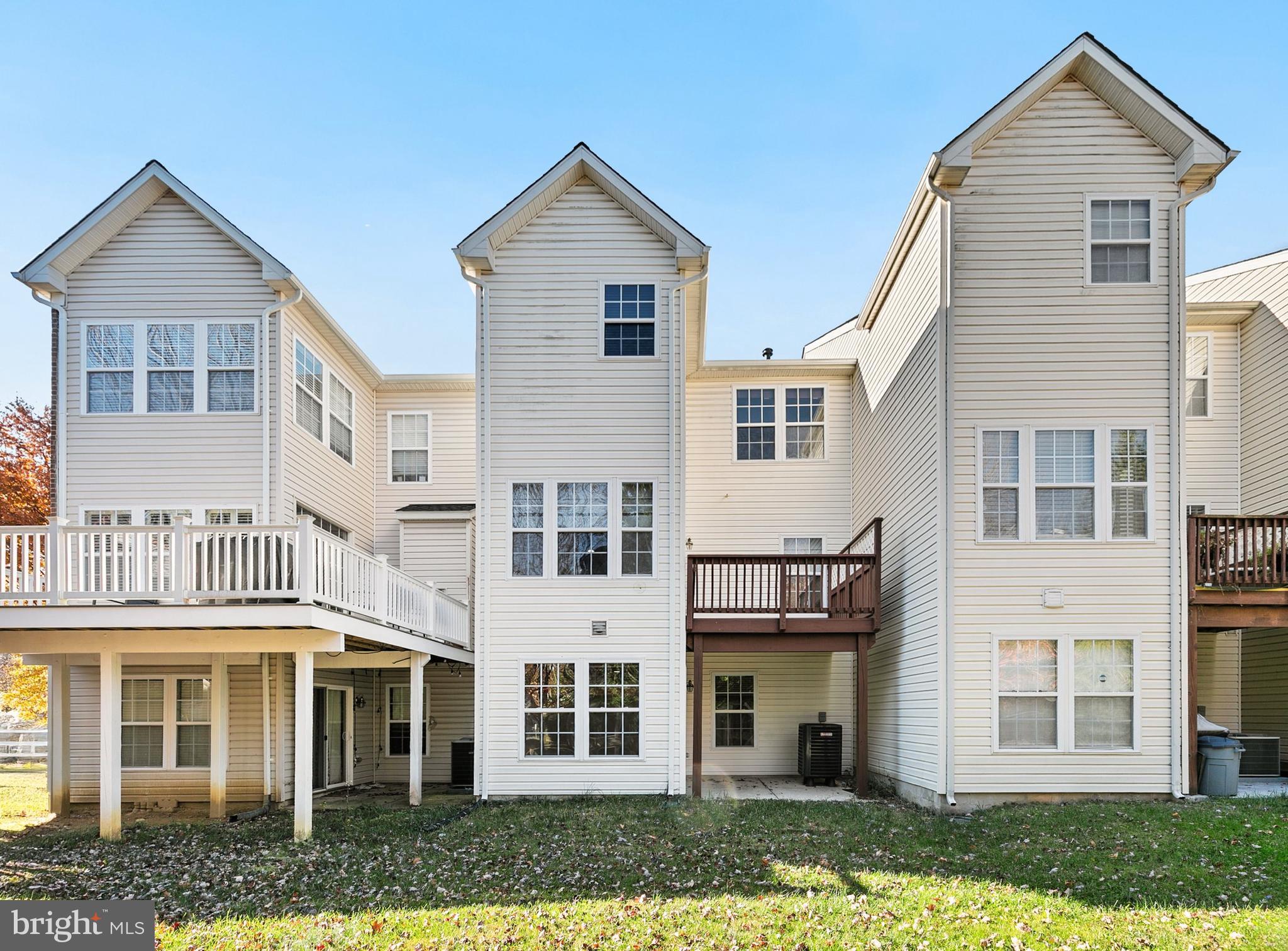 9956 Fragrant Lilies Way Laurel, MD 20723 - Photo 55 of 60 front view of a house with a yard