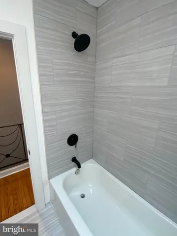 a bathroom with a tub