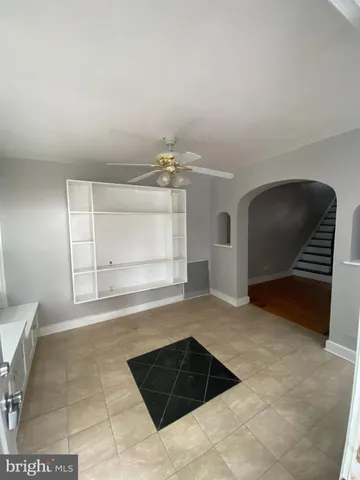 a view of a livingroom with furniture and window