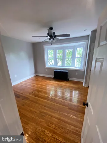 a view of empty room with windows