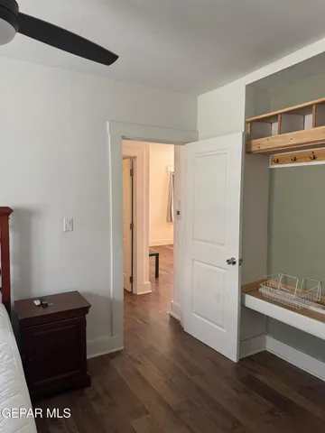 a room with a table and a window