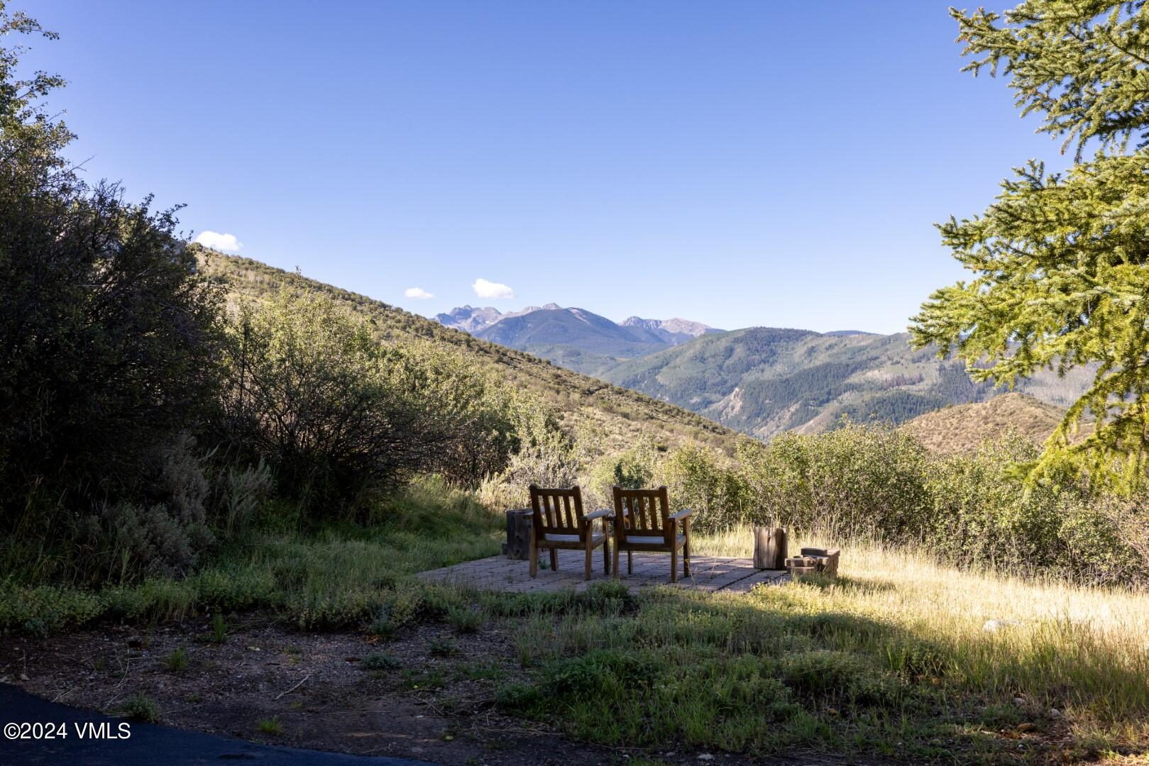2492 Draw Spur, Unit D Avon, CO 81620 - Photo 19 of 22 a view of a town with mountains in the background