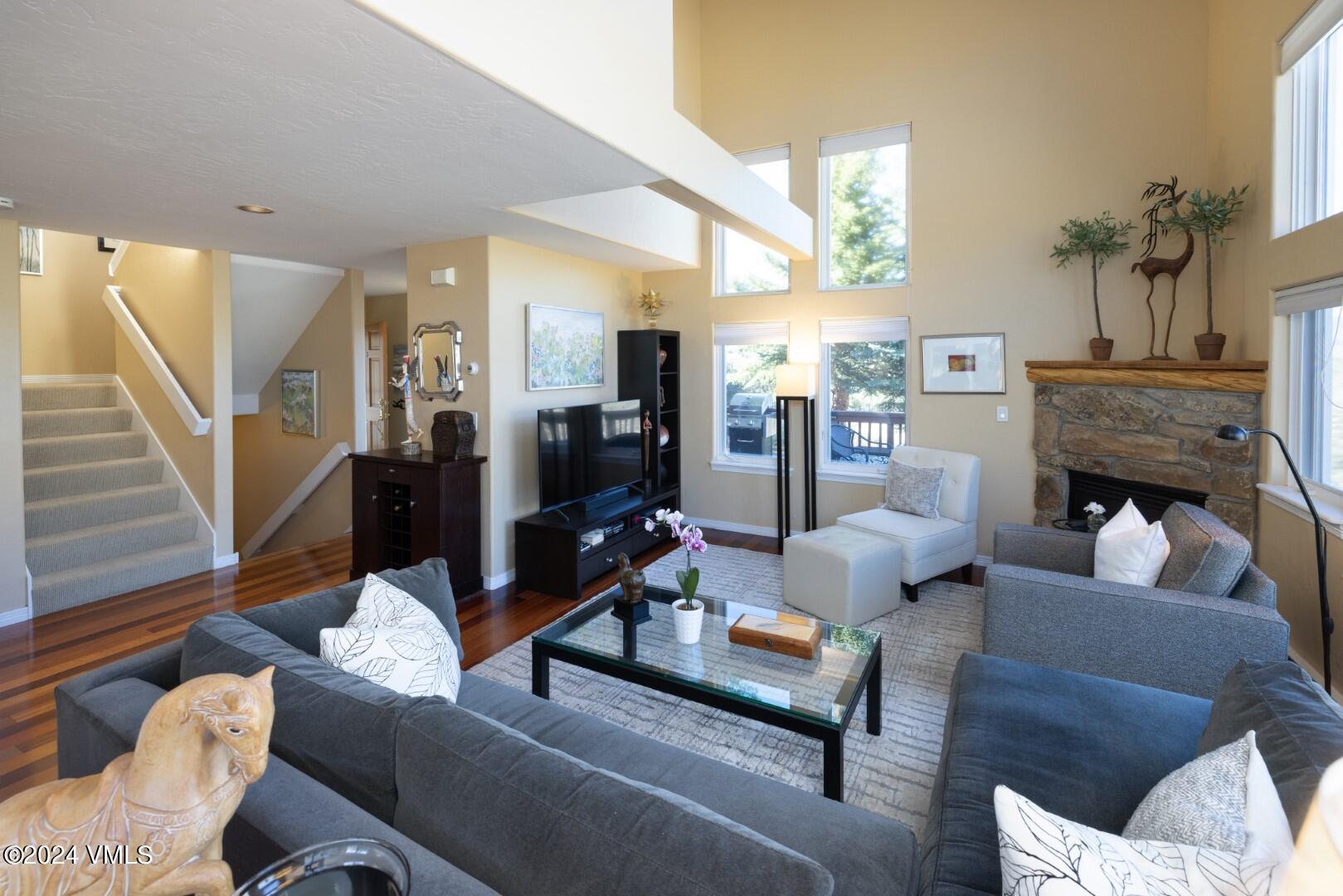 2492 Draw Spur, Unit D Avon, CO 81620 - Photo 2 of 22 a living room with furniture and a fireplace