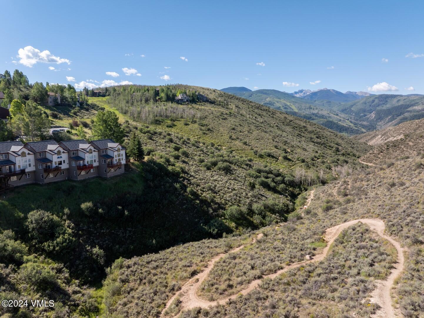 2492 Draw Spur, Unit D Avon, CO 81620 - Photo 21 of 22 a view of a houses with a yard