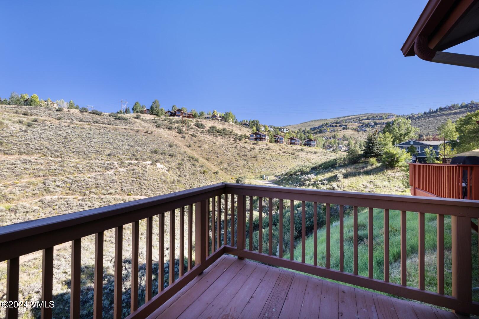 2492 Draw Spur, Unit D Avon, CO 81620 - Photo 8 of 22 a view of a mountain from a balcony