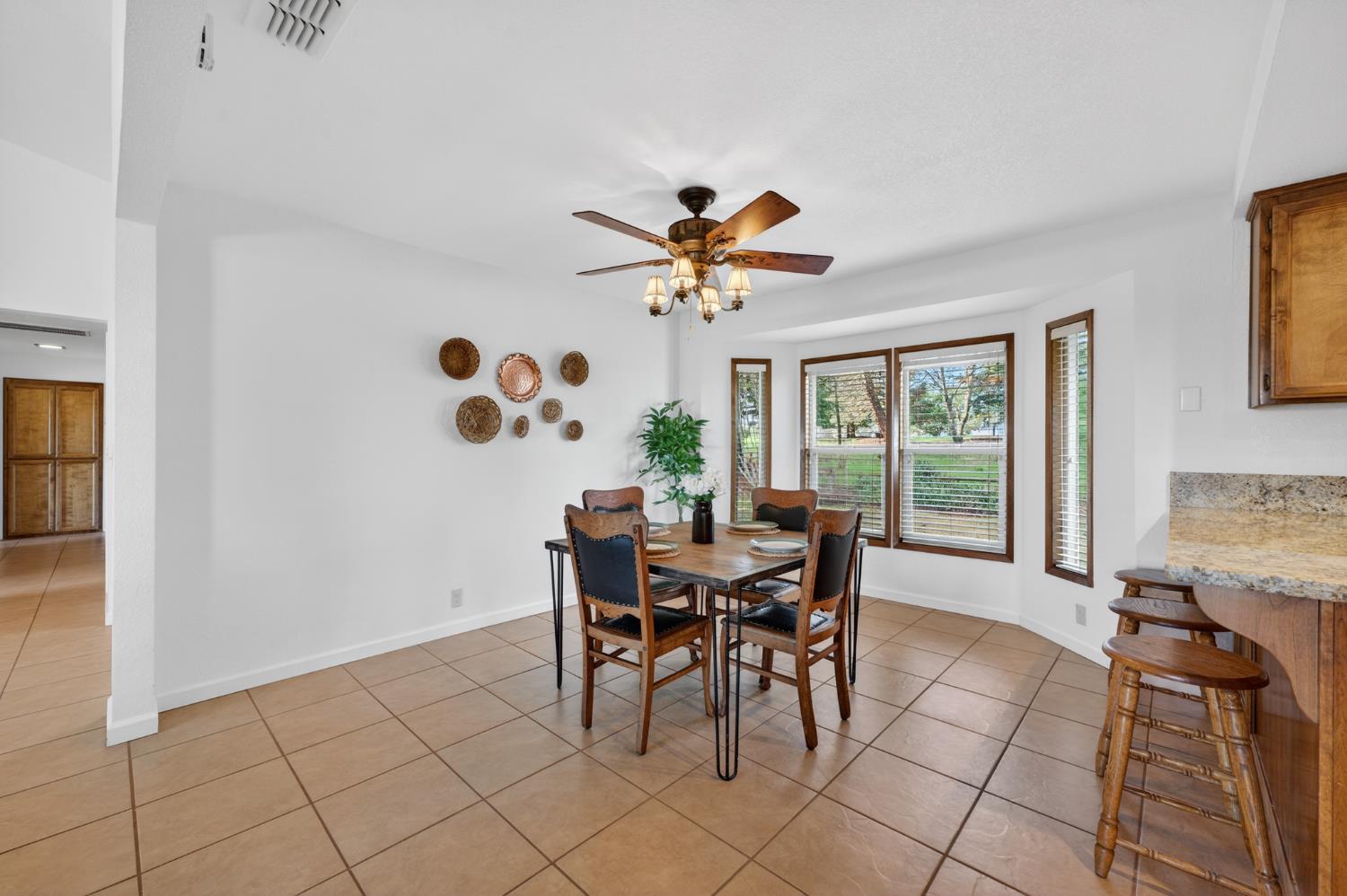 10919 Alta Mesa Road Wilton, CA 95693 - Photo 11 of 66 a dining room with furniture and window