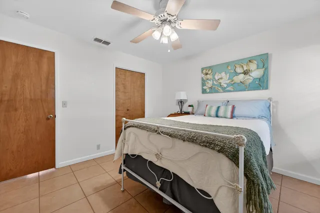 a bathroom with a bathtub a shower a sink and a mirror