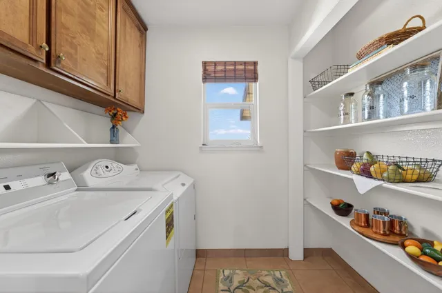 a view of a balcony with wooden floor