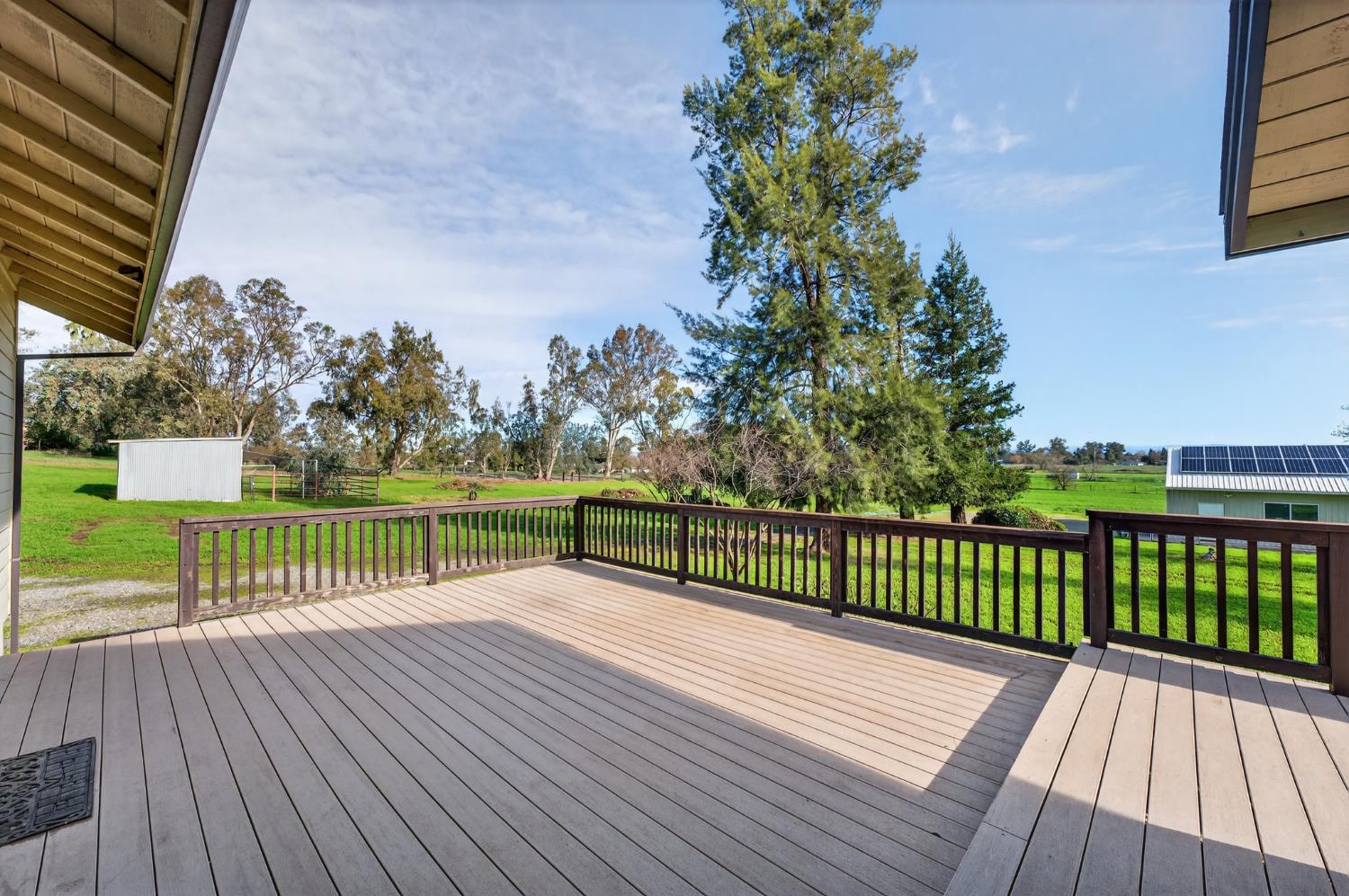 10919 Alta Mesa Road Wilton, CA 95693 - Photo 30 of 66 a view of a deck with a yard