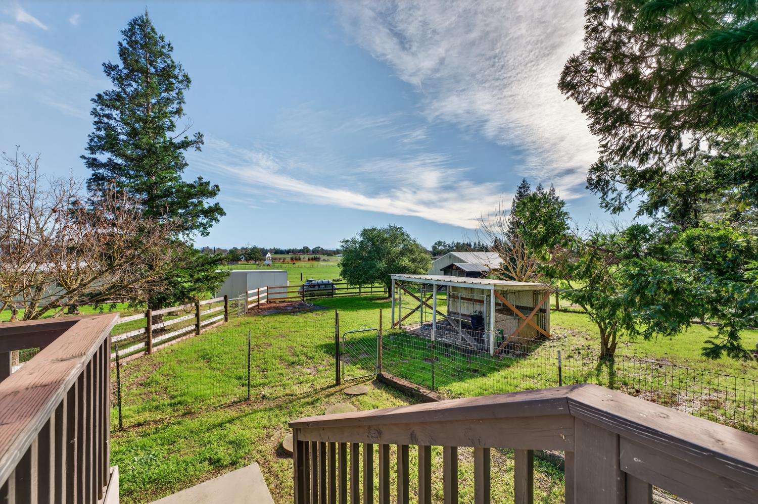 10919 Alta Mesa Road Wilton, CA 95693 - Photo 35 of 66 a view of a chairs and table in the balcony