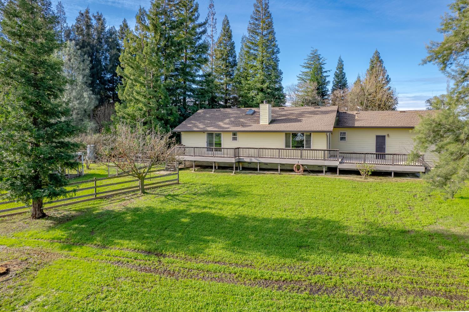 10919 Alta Mesa Road Wilton, CA 95693 - Photo 36 of 66 a view of a house with a big yard