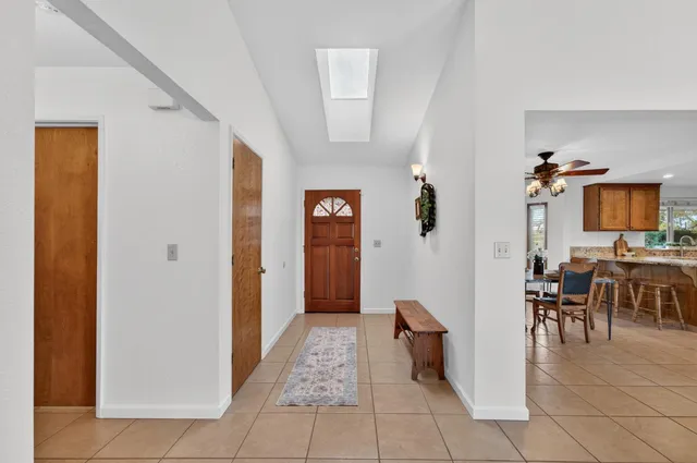 a view of a livingroom with furniture and window