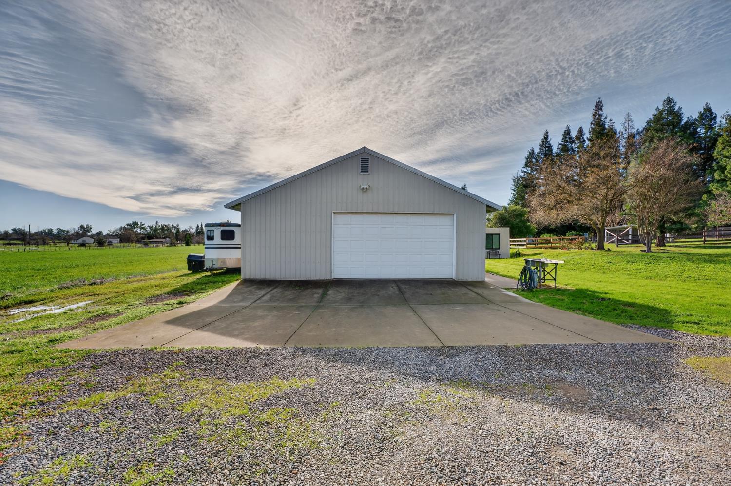 10919 Alta Mesa Road Wilton, CA 95693 - Photo 41 of 66 a house view with a outdoor space