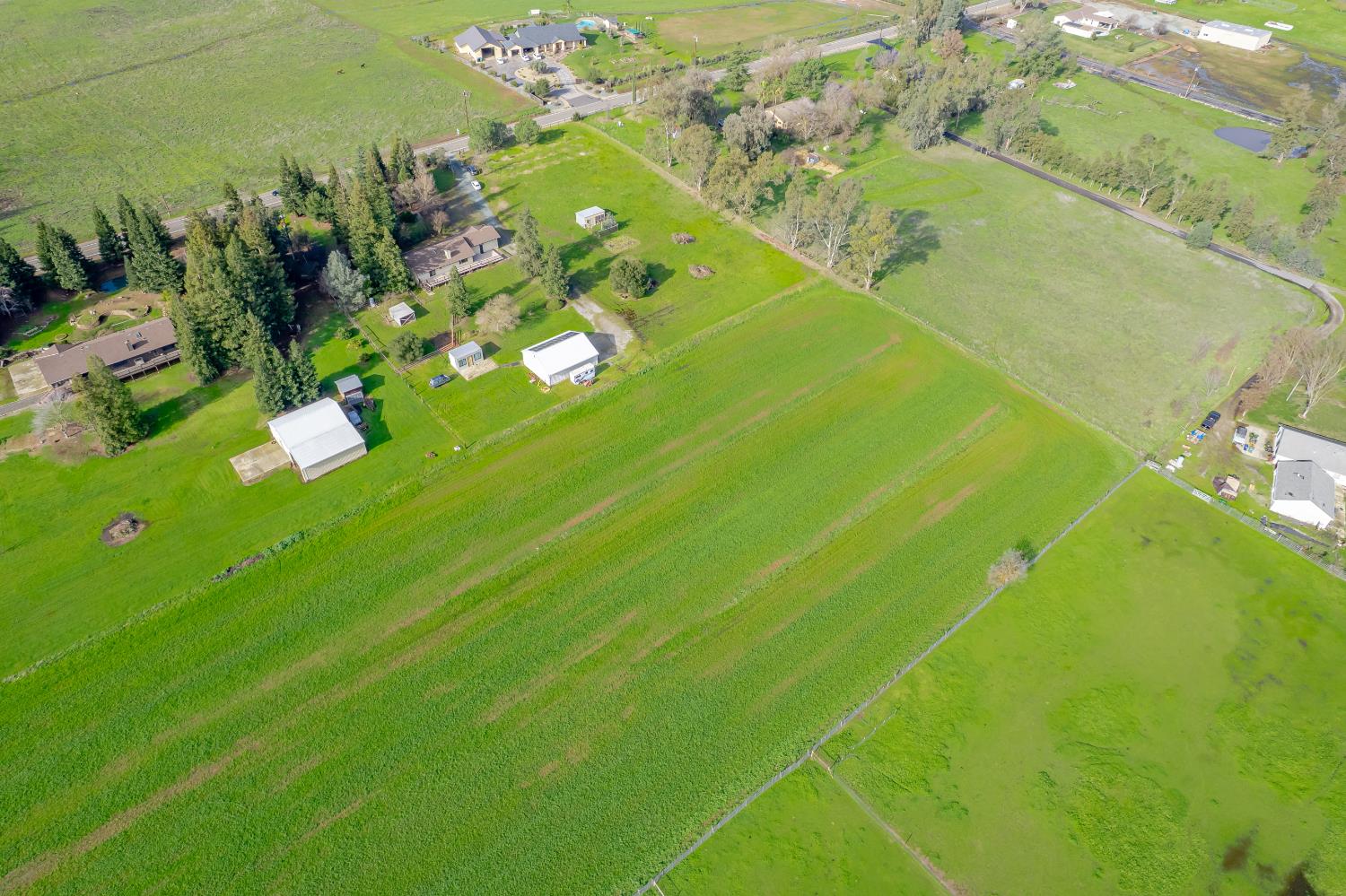 10919 Alta Mesa Road Wilton, CA 95693 - Photo 50 of 66 a view of a tennis court