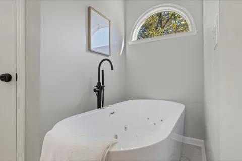 a bathroom with a bathtub