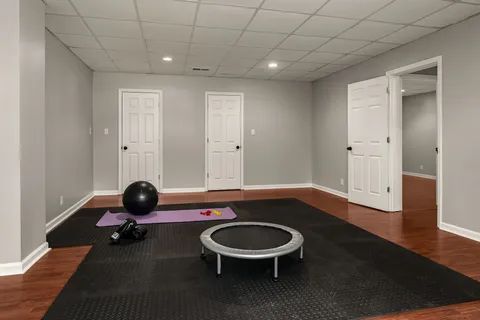 a room with furniture and air hockey table