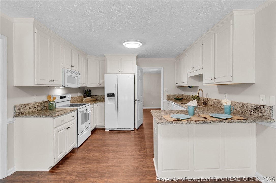 7837 Shuttle Road Fayetteville, NC 28311 - Photo 14 of 49 Kitchen with granite counters