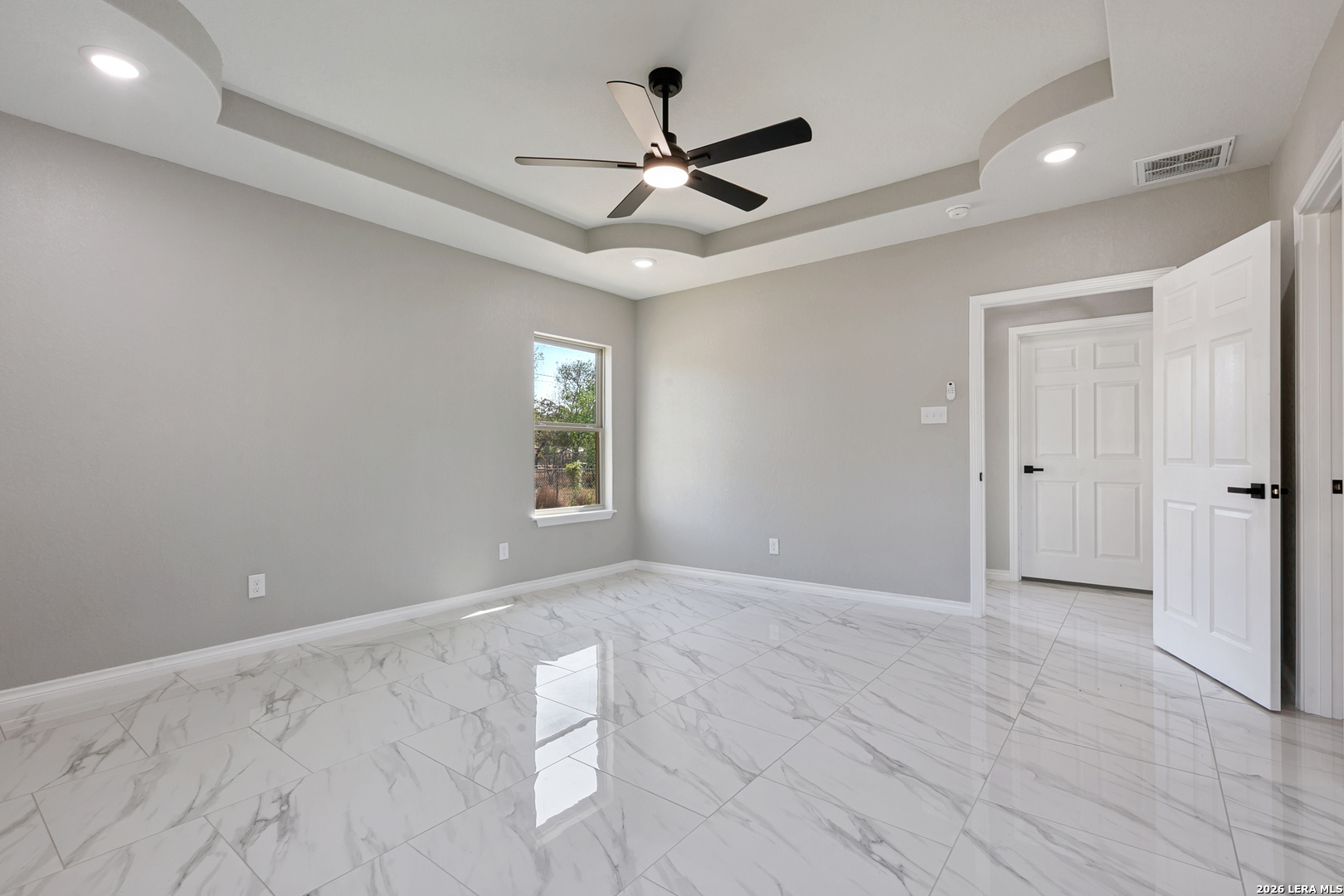 237 Avenue D Poteet, TX 78065 - Photo 19 of 27 a view of an empty room with a window