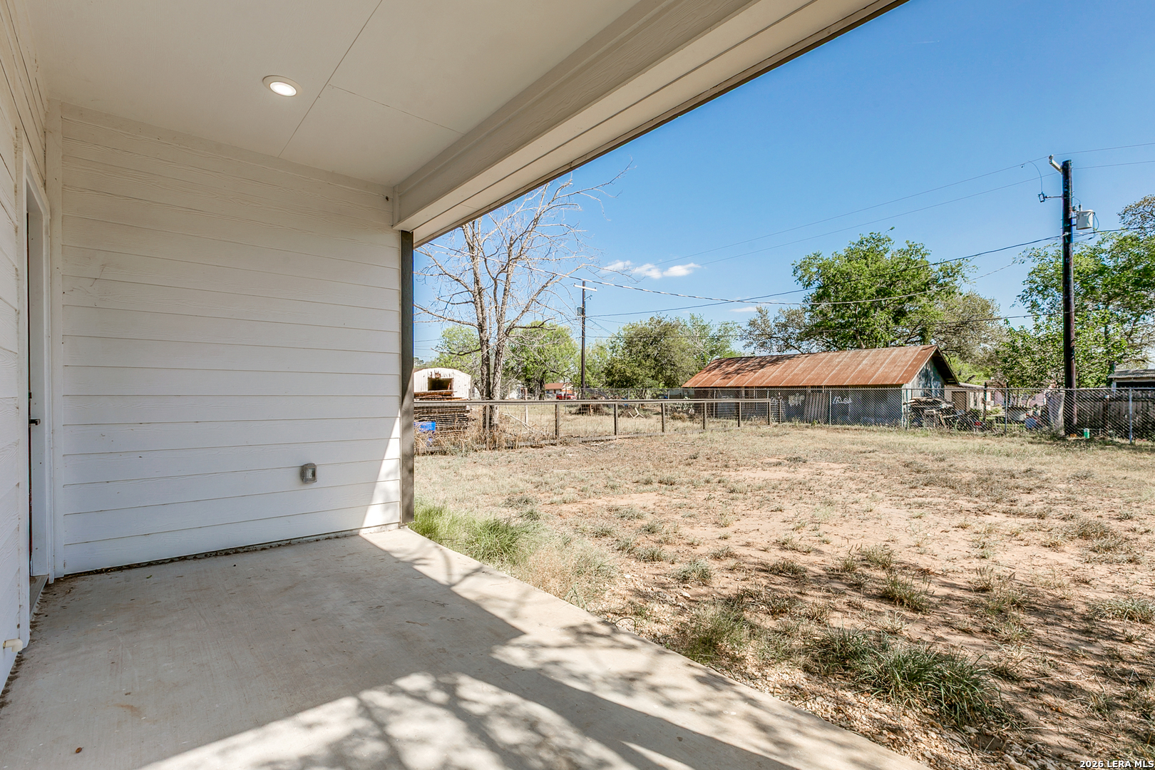 237 Avenue D Poteet, TX 78065 - Photo 26 of 27 a view of a house with a outdoor space