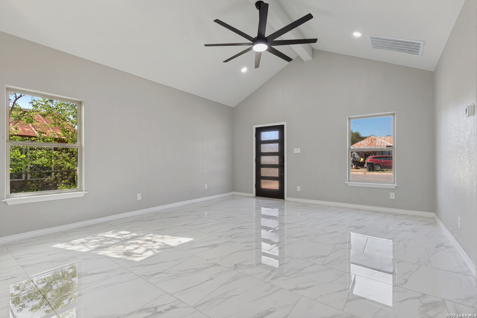 237 Avenue D Poteet, TX 78065 - Photo 5 of 27 a view of a livingroom with a large window