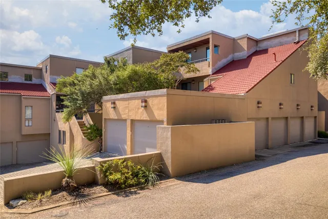 a view of a house with a garage
