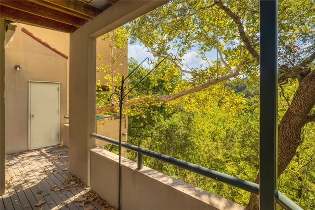 a view of a glass door and an outdoor space