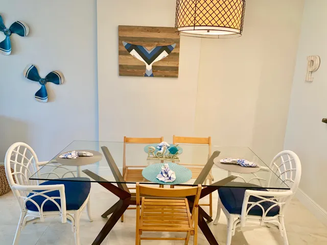 a view of a workspace with furniture