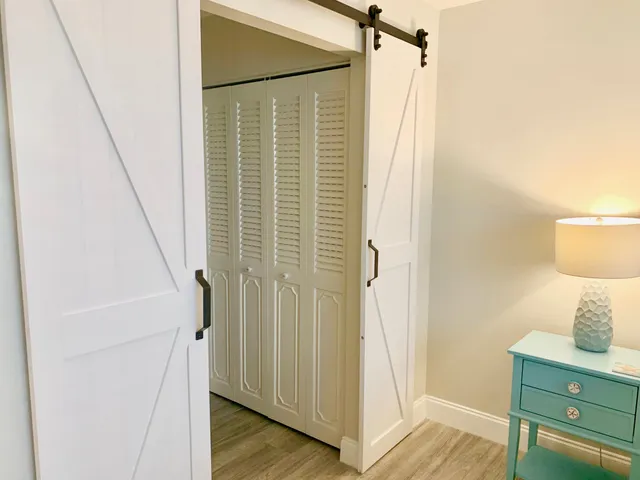 a room with a dresser and a mirror
