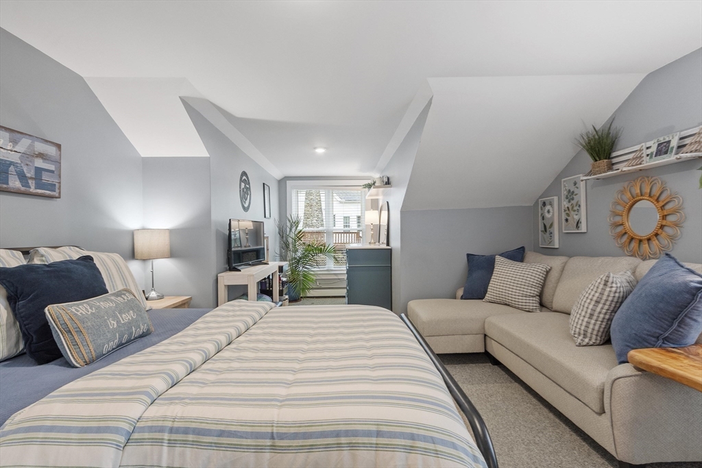 78 Wilder Road Leominster, MA 01453 - Photo 13 of 42 a large bedroom with a bed and window