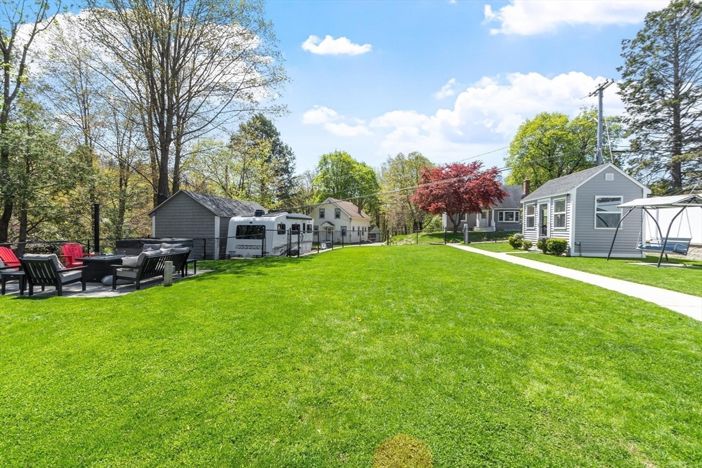 78 Wilder Road Leominster, MA 01453 - Photo 41 of 42 a view of a house with a big yard and large trees