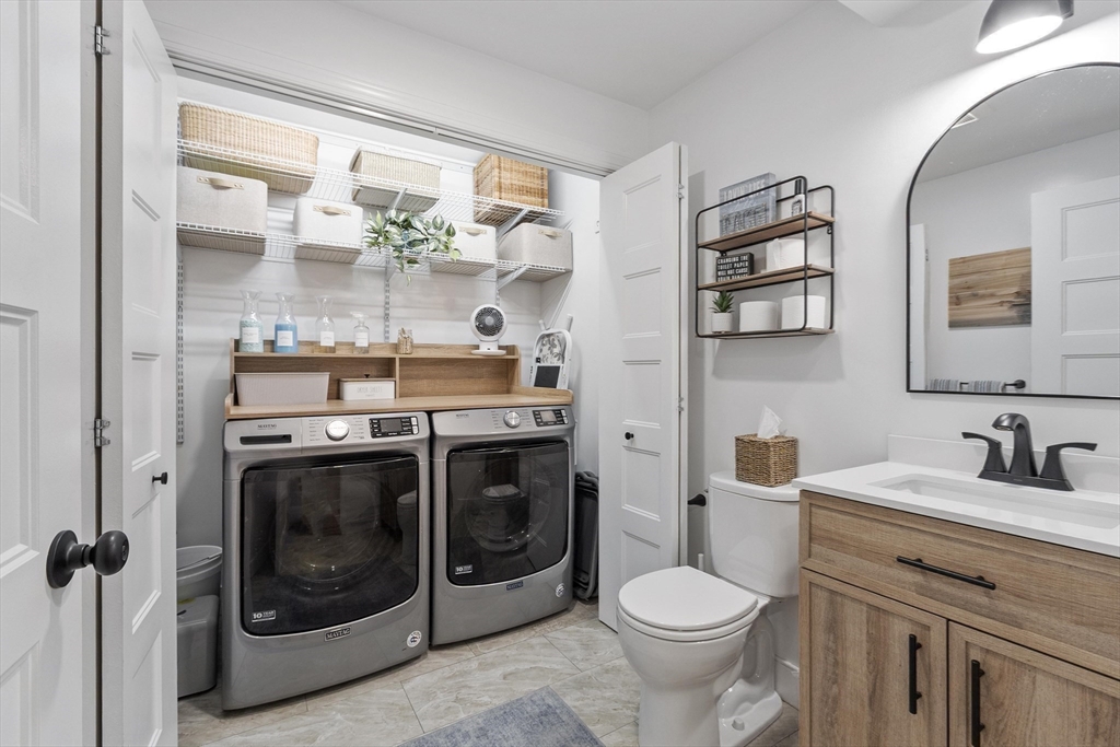 78 Wilder Road Leominster, MA 01453 - Photo 10 of 42 a bathroom with a sink a toilet and a mirror