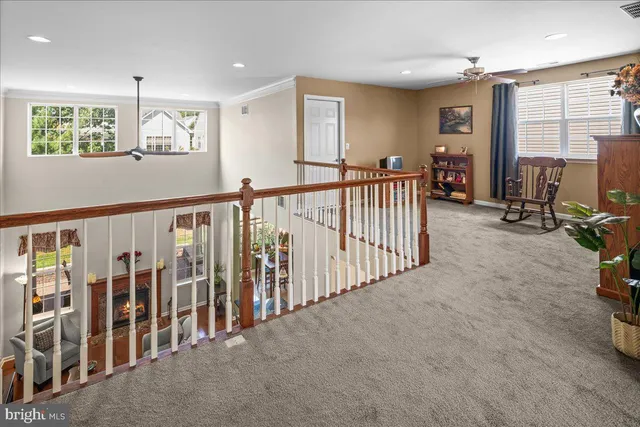 a view of a chair and table in the garden
