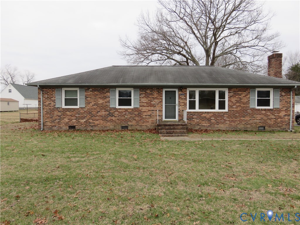 6729 Cold Harbor Road Mechanicsville, VA 23111 - Photo 1 of 22 a front view of a house with garden