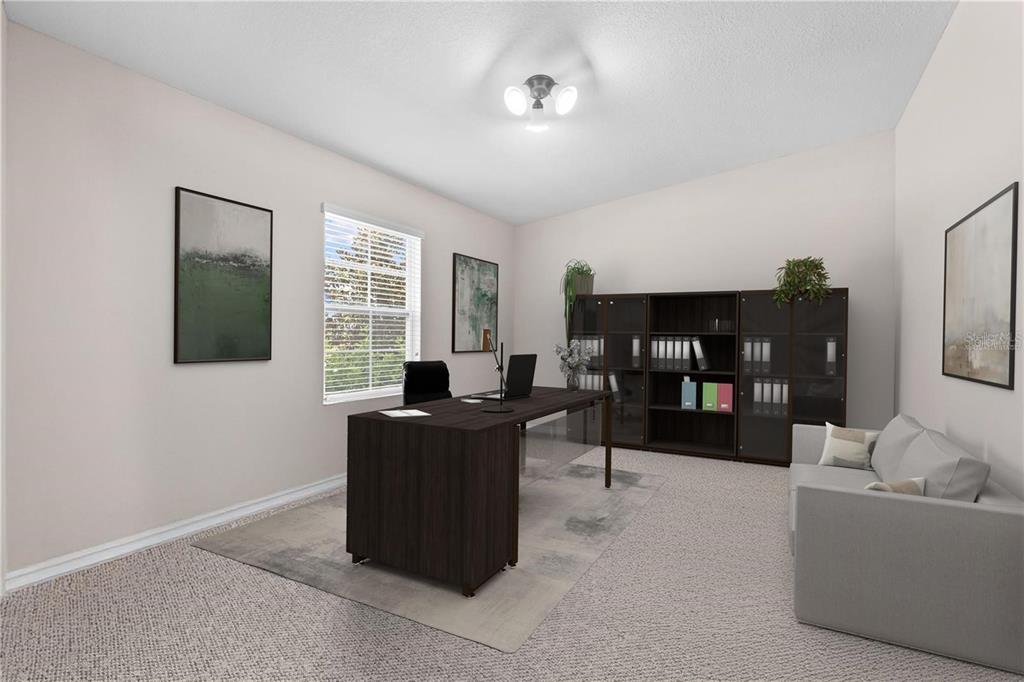 1619 Reflection Cove St. Cloud, FL 34771 - Photo 6 of 54 a living room with furniture and a flat screen tv