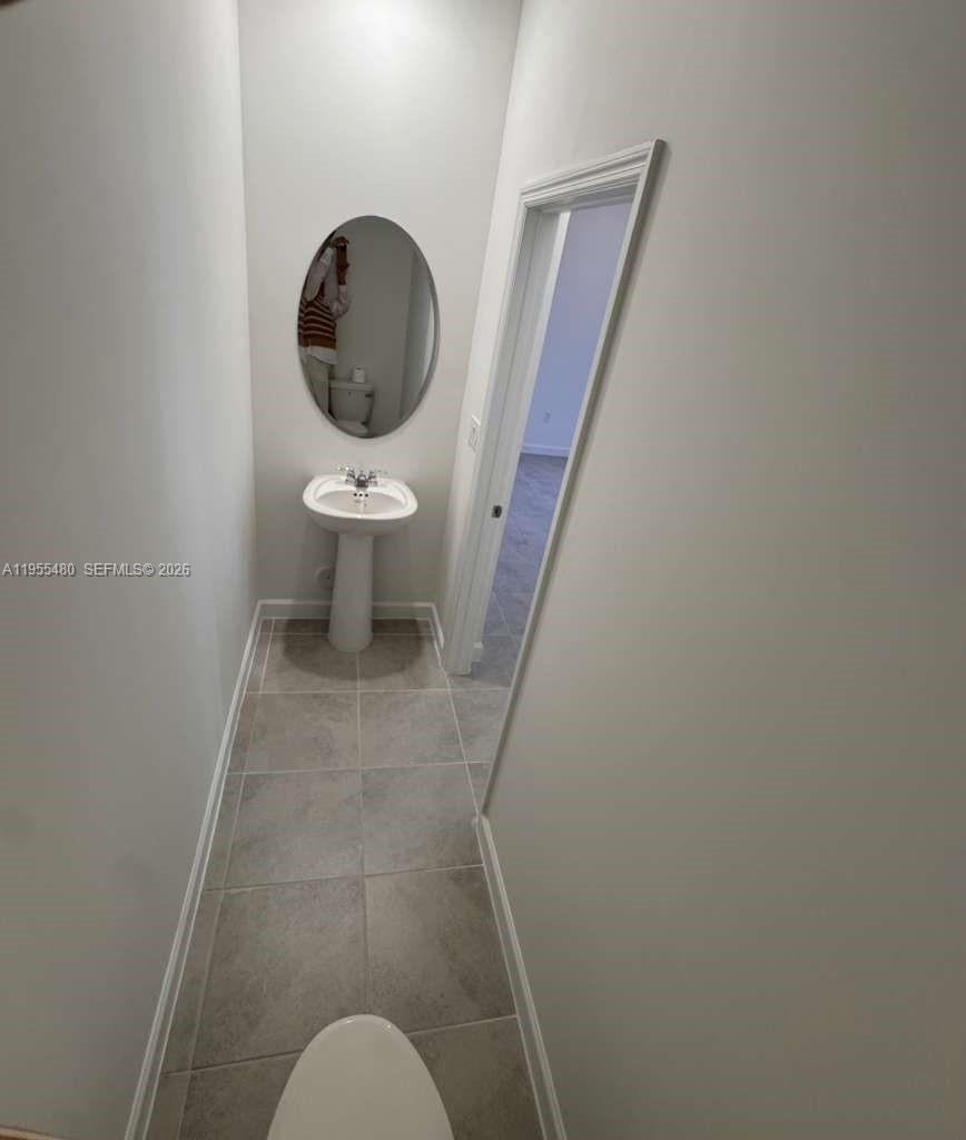 2721 Southeast 26th Road, Unit 2721 Homestead, FL 33035 - Photo 16 of 55 Half Bathroom Downstairs