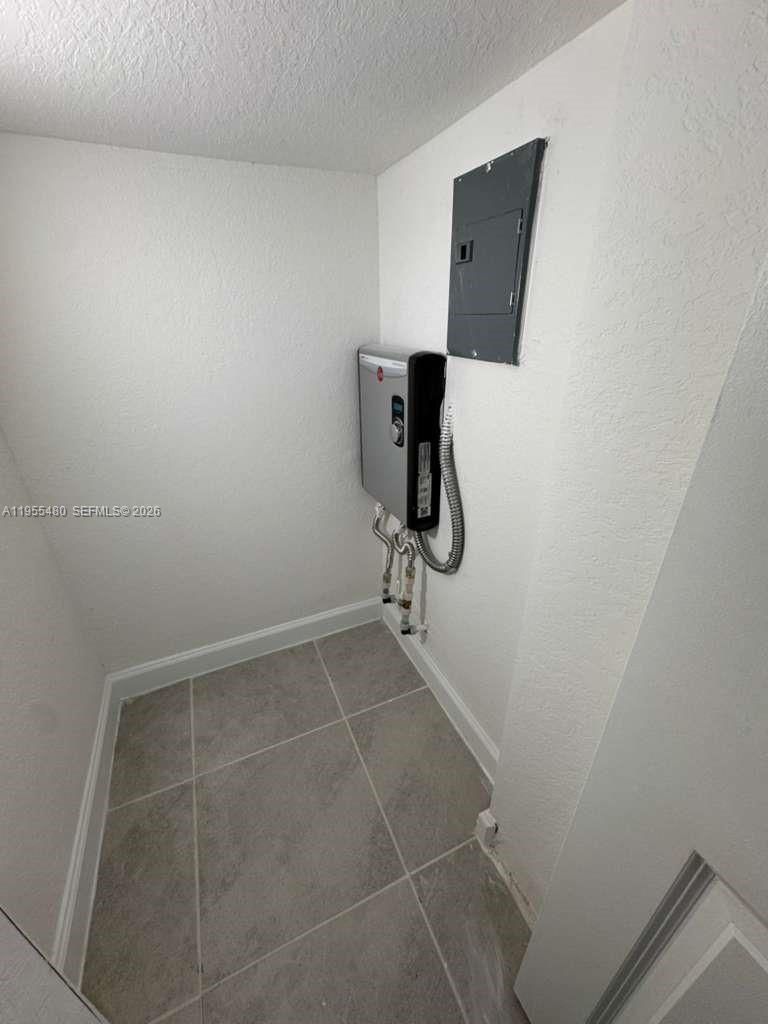 2721 Southeast 26th Road, Unit 2721 Homestead, FL 33035 - Photo 17 of 55 Deposit First Floor/ Waterless Heater