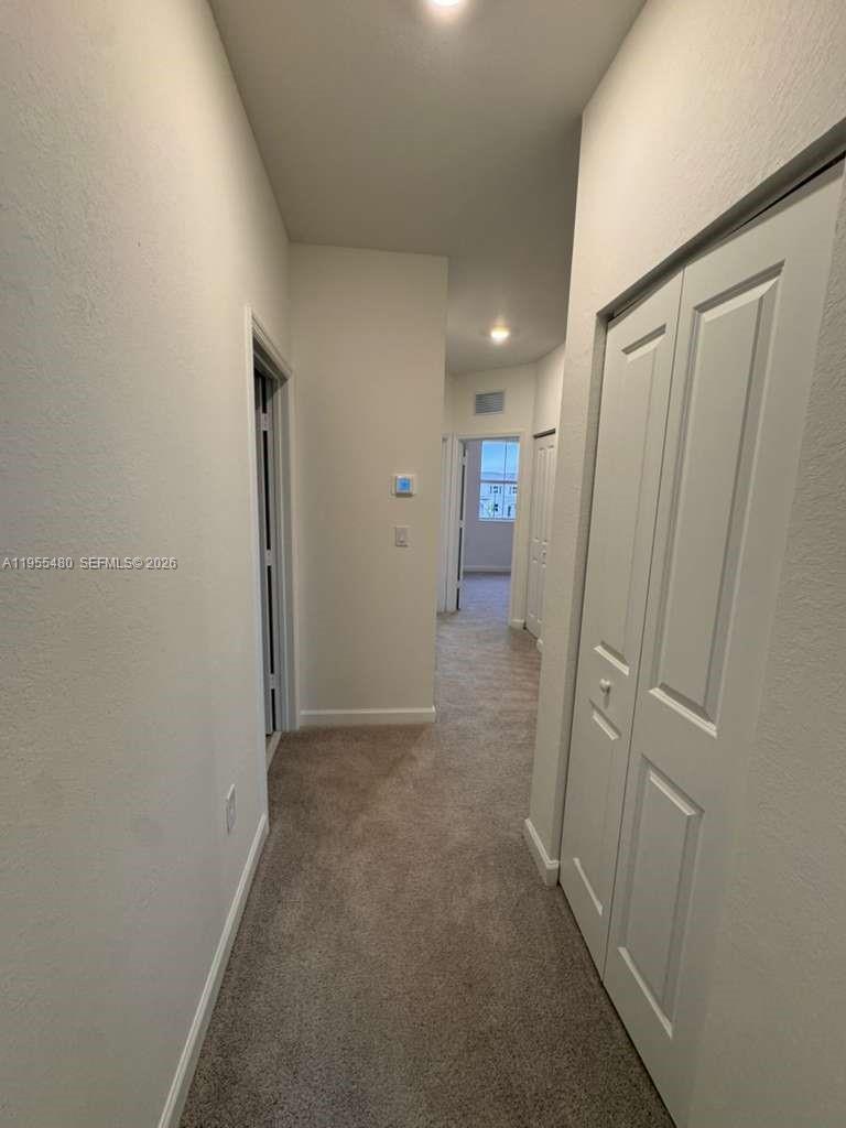 2721 Southeast 26th Road, Unit 2721 Homestead, FL 33035 - Photo 23 of 55 Hallway Second Floor