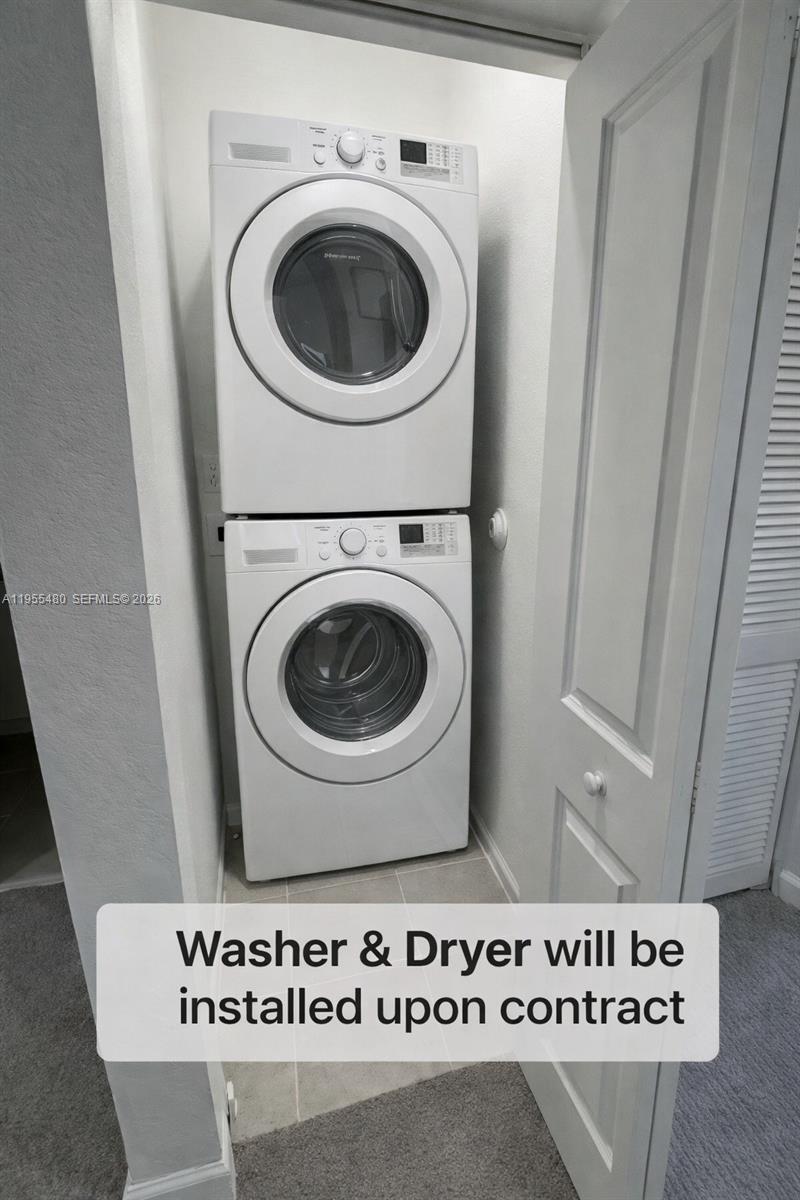 2721 Southeast 26th Road, Unit 2721 Homestead, FL 33035 - Photo 27 of 55 a utility room with dryer and washer