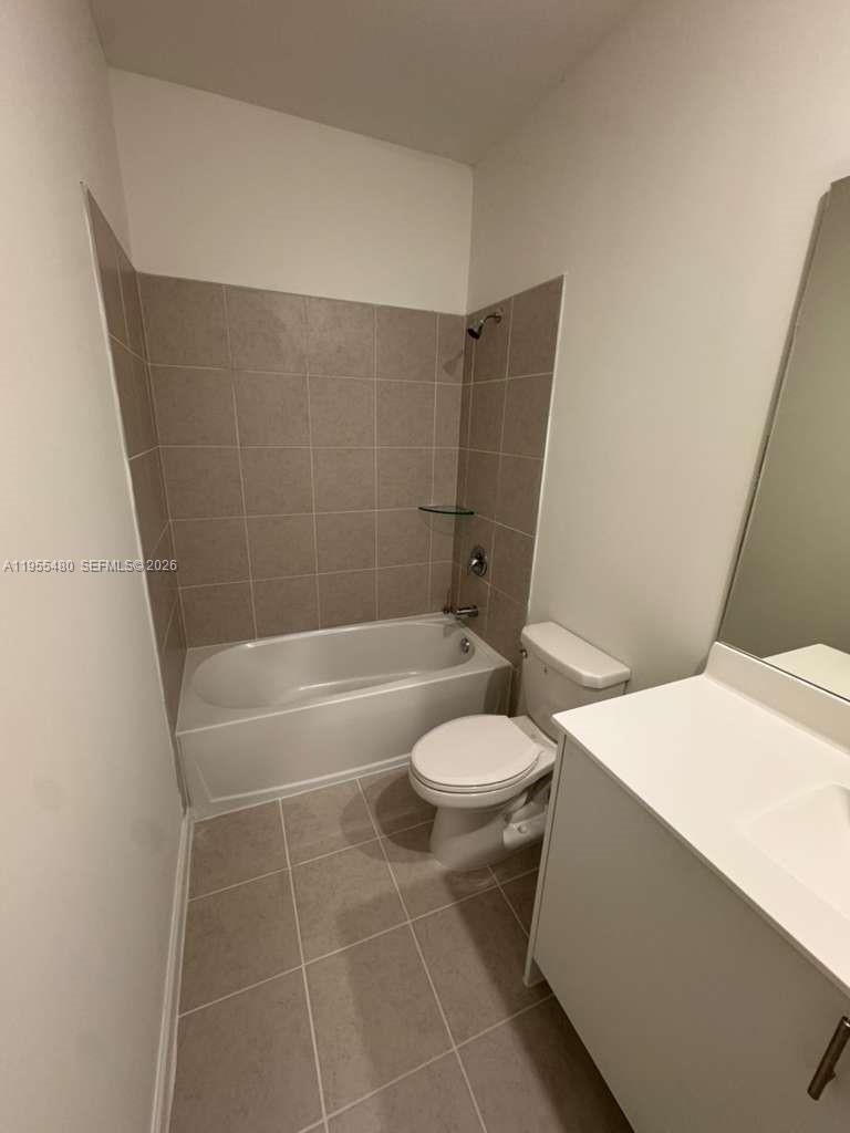 2721 Southeast 26th Road, Unit 2721 Homestead, FL 33035 - Photo 29 of 55 a bathroom with a bathtub and toilet