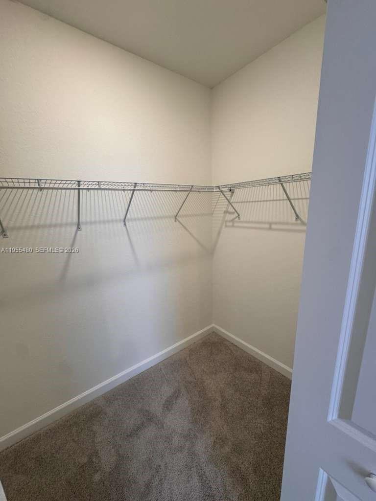 2721 Southeast 26th Road, Unit 2721 Homestead, FL 33035 - Photo 39 of 59 Master Walking Closet
