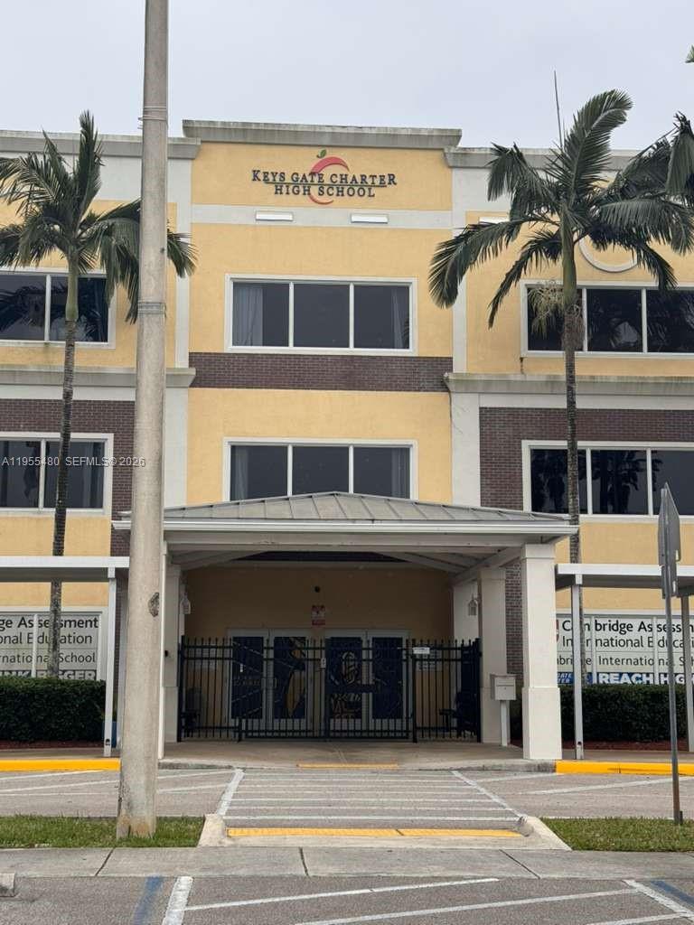 2721 Southeast 26th Road, Unit 2721 Homestead, FL 33035 - Photo 42 of 55 a view of a building with a entrance