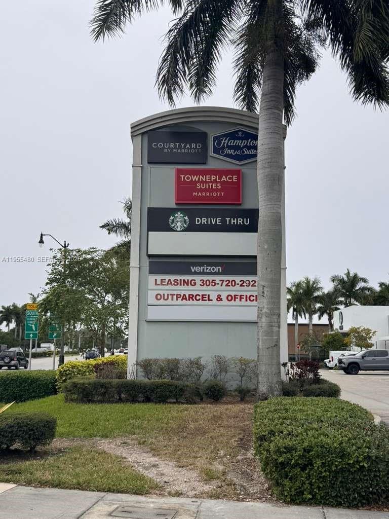 2721 Southeast 26th Road, Unit 2721 Homestead, FL 33035 - Photo 44 of 55 a sign on the side of a building