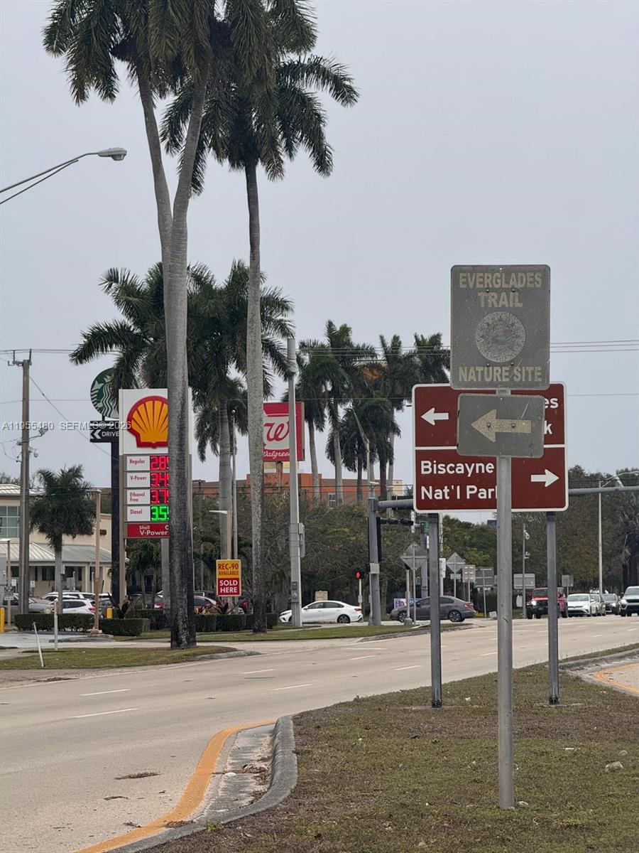 2721 Southeast 26th Road, Unit 2721 Homestead, FL 33035 - Photo 48 of 55 a street sign on a street corner