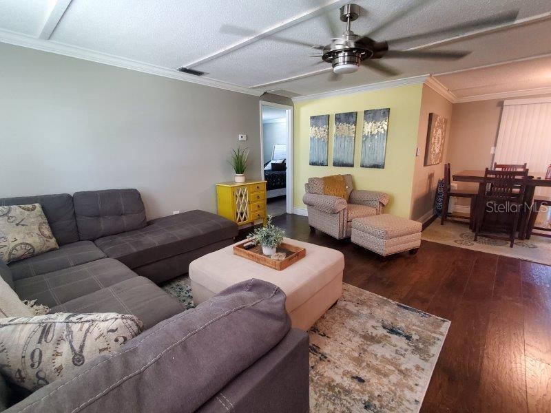 22274 Westchester Boulevard Port Charlotte, FL 33952 - Photo 4 of 18 a living room with furniture and a window