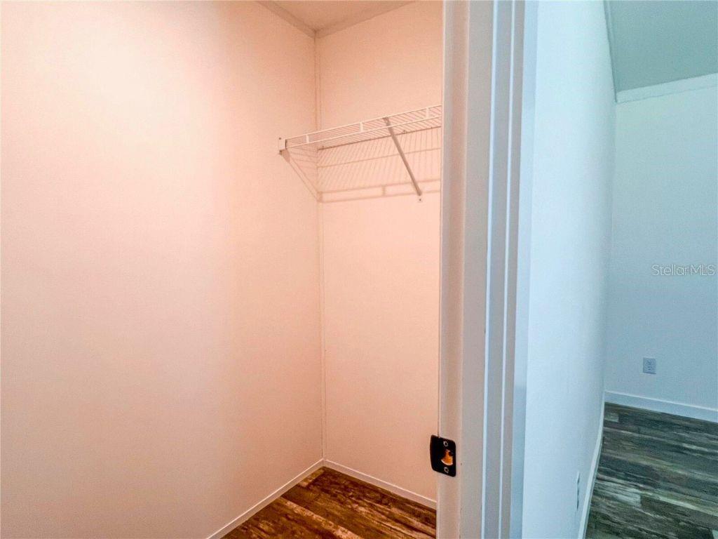 16108 Gupton Street Brooksville, FL 34613 - Photo 24 of 27 a bathroom with a window