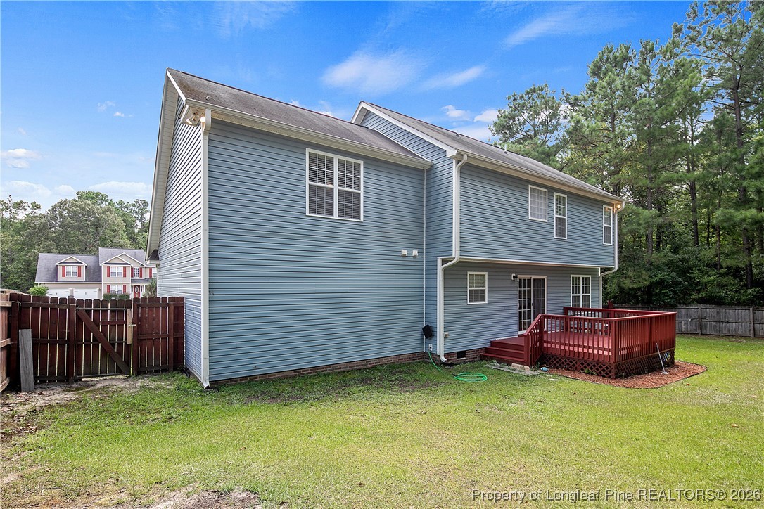 15 Rockingham Street Spring Lake, NC 28390 - Photo 15 of 15 a view of a house with a backyard